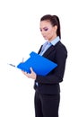 Business woman writing on a clipboard Royalty Free Stock Photo