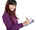 Business woman writing on document