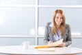 Business Woman Writing notes at desk Royalty Free Stock Photo