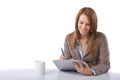 Business Woman Writing notes at desk Royalty Free Stock Photo