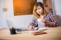 Business woman writing something on notepad in office Royalty Free Stock Photo