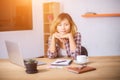 Business woman writing something on notepad in office Royalty Free Stock Photo