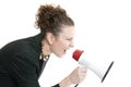 Business woman yelling into a bullhorn Royalty Free Stock Photo