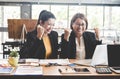 Business women celebrating good project results