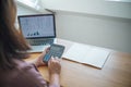 Business women checking bills. taxes bank account balance and calculating annual financial statements of company. Accounting