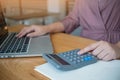 Business women checking  bills. taxes bank account balance and calculating  annual financial statements of company. Accounting Royalty Free Stock Photo