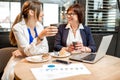 Business women during a coffee time in the cafe Royalty Free Stock Photo