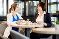 Business women during a coffee time in the cafe Royalty Free Stock Photo