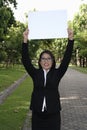 Business women holding signs