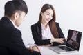 Business women are introducing or consulting businesses to male employees with laptop