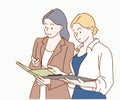 Business women looking at tablet and working together in office workspace.Team work concept. Hand drawn
