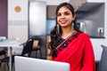 business women in sari laptop working in living room at home Royalty Free Stock Photo