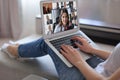 Business woman talking to her colleagues in video conference. Business team working from home using laptop Royalty Free Stock Photo