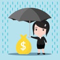 Business women with umbrella in the rain protects a stacks