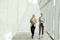 Business women walking in the office corridor Royalty Free Stock Photo