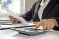 Business women wear black suits with finger calculators to calculate office expenses.