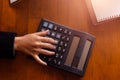 Business women  working with calculator and  business document on office table in office. finance accounting concept Royalty Free Stock Photo