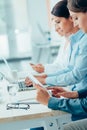 Business women working at office desk Royalty Free Stock Photo