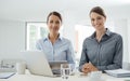 Business women working together with a tablet Royalty Free Stock Photo