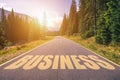 Business word written on road in the mountains Royalty Free Stock Photo