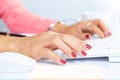 Business at work. close up hands woman working using laptop computer, .side view of business using computer working in the office Royalty Free Stock Photo