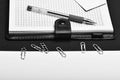 Business and work concept. Organizer and pen on black and white background, close up Royalty Free Stock Photo