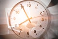 Business working time, office hours concept. businesspeople using laptop computer overlay clock face Royalty Free Stock Photo