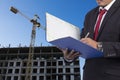 Business, Writing, Note Pad on Construction background Royalty Free Stock Photo