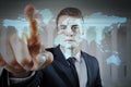 Business young man pointing something over world map hologram. Concept of abuse of power and capitalism Royalty Free Stock Photo