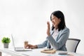 business young woman having video call via laptop in the office Royalty Free Stock Photo