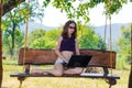 Business young woman working on laptop on vacation, free space. Royalty Free Stock Photo