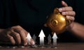 Businesses hand stocking coins and gold piggy banks with arrow growing up economic growth signs. financial investment concept,