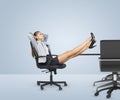 Businesslady sitting in chair with her hands