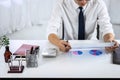 Businessman accountant working audit and calculating expense financial data on graph documents, doing finance in workplace Royalty Free Stock Photo