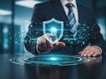 Businessman activating security shield on digital interface Royalty Free Stock Photo