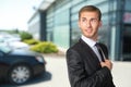 Businessman adjusting his tie Royalty Free Stock Photo