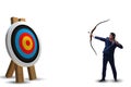 The businessman aiming arrow with bow Royalty Free Stock Photo