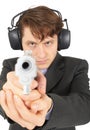 Businessman aiming a gun, on white background