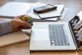 A businessman analyzes the market and plays with a stress ball