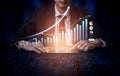 Businessman Analyzing Data Trends with Graphs and Charts on Digital Background Illustrating Growth, Technology, and Royalty Free Stock Photo