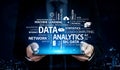 Businessman Analyzing Data Trends on Tablet with Technology Words in the Background, Representing Cloud Computing and Royalty Free Stock Photo