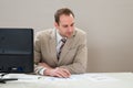 Businessman analyzing graph in office Royalty Free Stock Photo