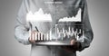 Businessman Analyzing Summary Report with Digital Graphs and Charts on Tablet Device in Modern Office Environment Impute Royalty Free Stock Photo