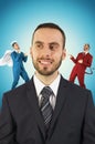 Businessman with angel and devil on his shoulders. Royalty Free Stock Photo