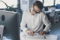 Businessman answering phone calls in the office Royalty Free Stock Photo