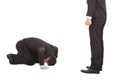 Businessman apologize to boss with japanese kneeling position Royalty Free Stock Photo