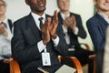 Businessman applauding at seminar Royalty Free Stock Photo