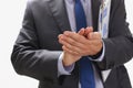 Businessman applauds at a seminar to the lecturer