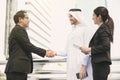 Businessman arabic with engineer making handshake agreement. Royalty Free Stock Photo