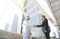 Businessman arabic with engineer making handshake agreement. Royalty Free Stock Photo